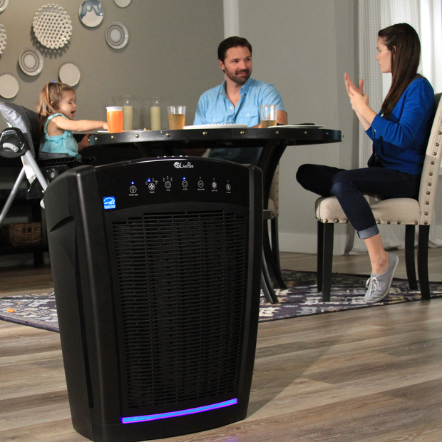 Family Eating Dinner with LivePure Bali Series Air Purifier