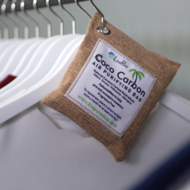 LivePure CocoCarbon Air Purifying Bag Hanging in Closet
